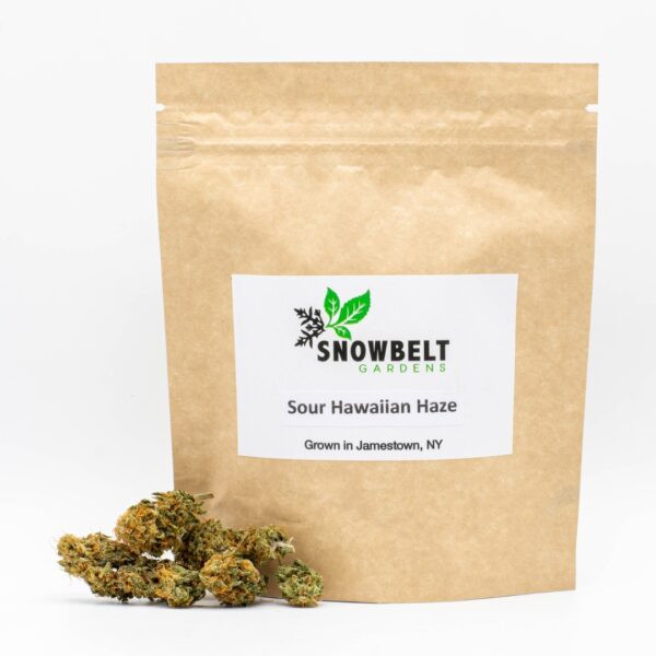 Several Sour Hawaiian Haze hemp flowers by Snowbelt Gardens, next to its packaging, on a white background.