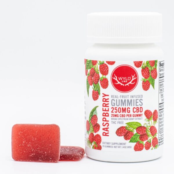 A 40-count bottle of Wyld CBD Raspberry Gummies, next to two of the gummies, on a white background.