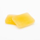 Two WYLD CBD + CBC Peach Gummies on a white background