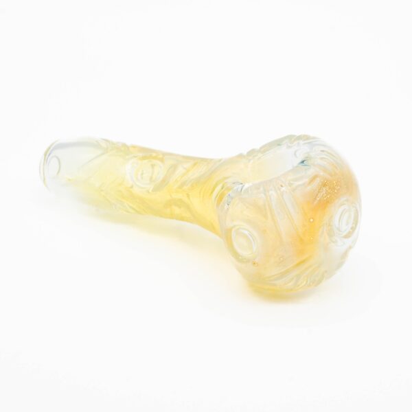 A Paul Taylor Glass Carved Basic Fume Spoon, on a white background.