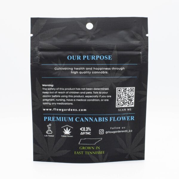 The backside of a 3.5g bag of OG Gelato hemp flower, on a white background