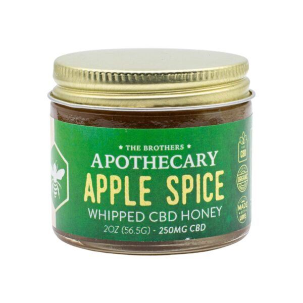 A jar of Apple Spice - CBD Honey by The Brothers Apothecary, on a white background