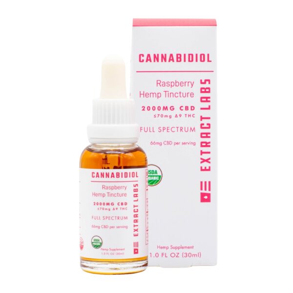 A tincture of Extract Labs Raspberry CBD Oil, next to its box, on a clear background